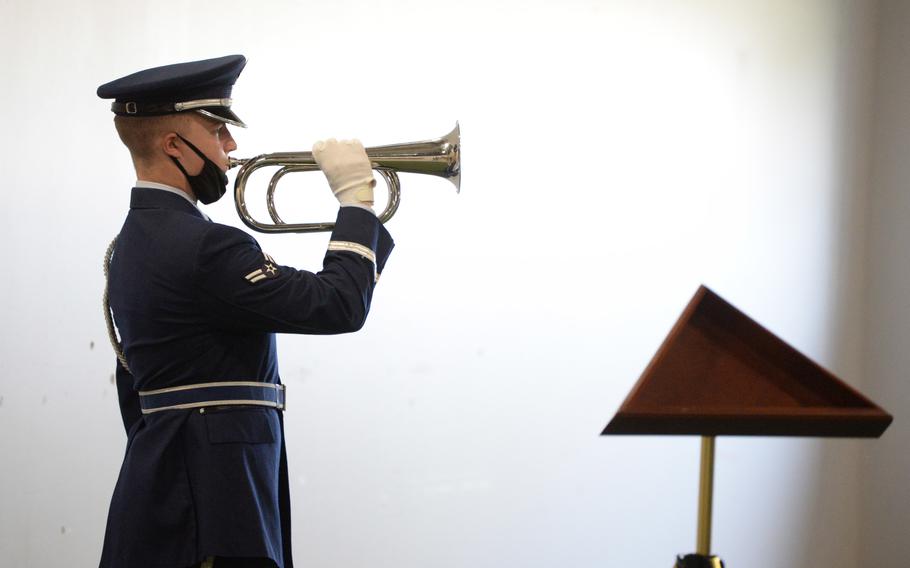 U.S. Air Force Airman 1st Class Blake Cassick plays Taps at Wright-Patterson Air Force Base, Ohio, April 20, 2021. 