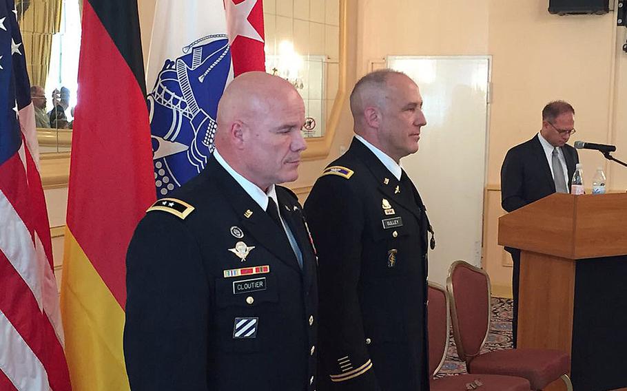 Col. Richard Gulley stands with Maj. Gen. Roger Cloutier, at the time U.S. Africa Command's chief of staff, during the colonel's June 2017 retirement ceremony in Stuttgart. Gulley is suing the service for refusing to provide internal records that he says could help clear his name, which he said was tarnished after being subjected to a criminal investigation over housing allowance payments.