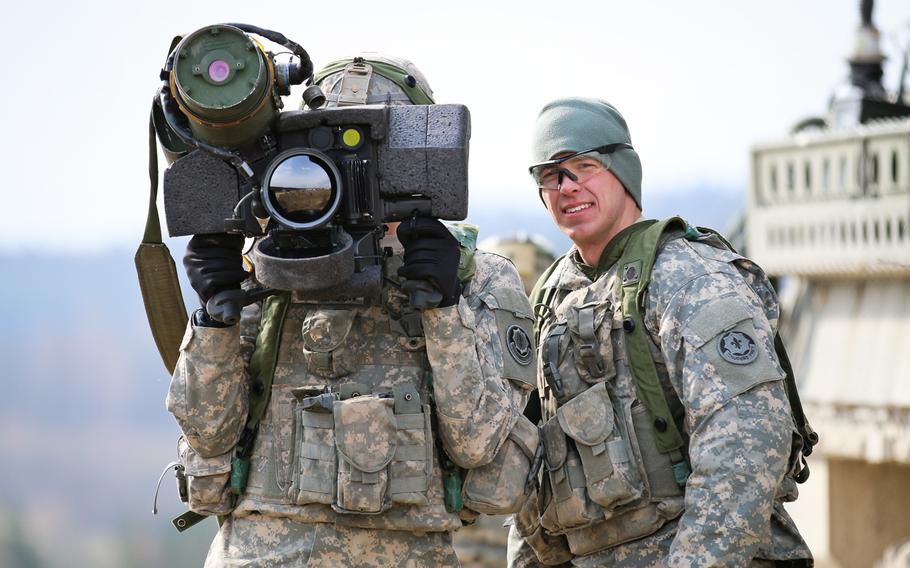 Soldiers of the U.S. Army 2nd Cavalry Regiment's 1st Squadron calibrate their Javelin missile launcher's Multi Integrated Laser System (MILES) on Monday, April 6, 2015, prior to the start of field operations for Saber Junction 15 in Hohenfels, Germany.