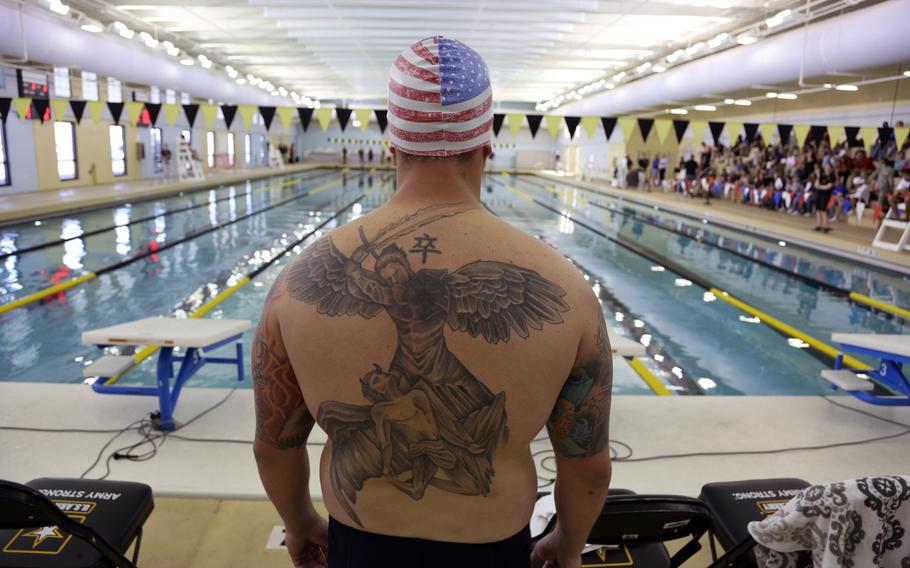 U.S. Army Staff Sgt. Joshua Palmer, Warrior Transition Unit, Fort Leonard Wood, Missouri, focuses on his lane before his race during the 2015 Army Trials swimming competition at the Aquatics training Center, Fort Bliss, Texas.