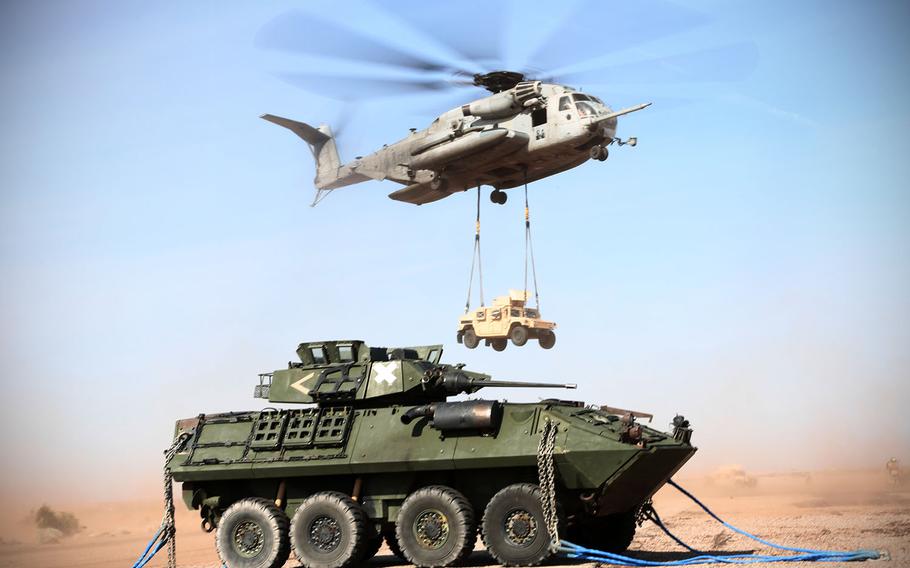 A U.S. Marine CH-53E Super Stallion with Marine Heavy Helicopter Squadron 361 conducts an external lift exercise at auxiliary airfield 2 near Yuma, Ariz., April 3,2015.