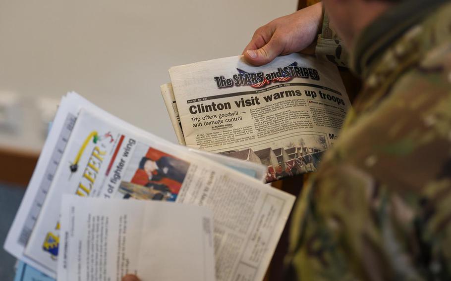 U.S. Air Force Staff Sgt. Michael D. Szydlowski, a 57th Rescue Squadron pararescueman, reviews an article from Stars and Stripes dated November 24, 1998, at Aviano Air Base, Italy, on May 15, 2020. 