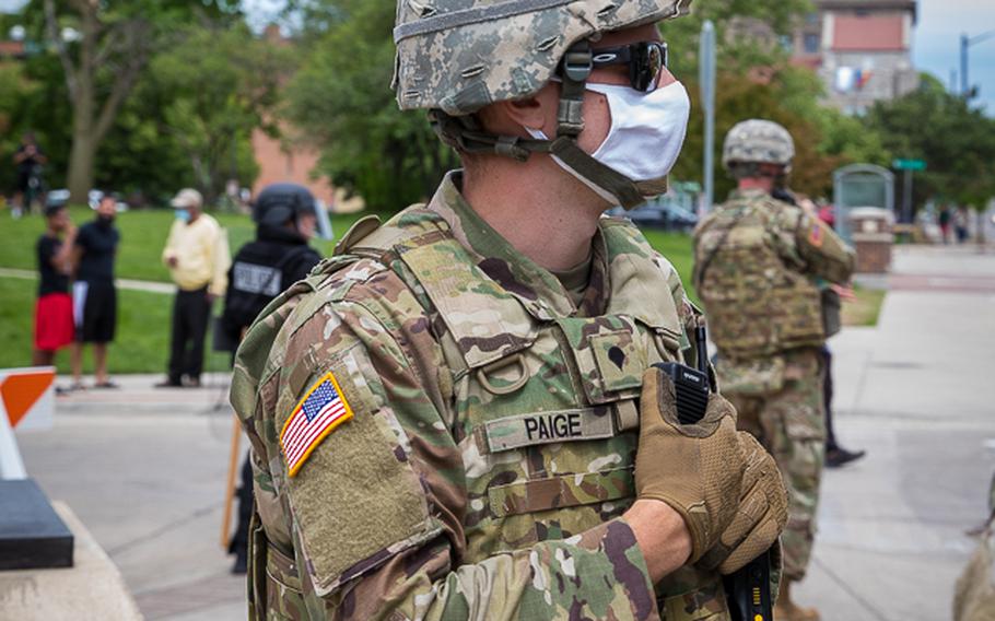 Military police from the Michigan National Guard work in Grand Rapids on June 1, 2020, to ensure peace during a protest downtown.