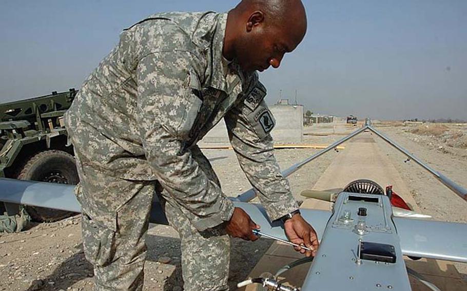 U.S. Army Staff Sgt. Alton Jefferson, from Bravo Company, 173rd Special Troops Battalion, prepares an RQ-7 Shadow unmanned aerial vehicle for launch from Forward Operating Base Fenty in Jalalabad, Afghanistan, March 17, 2008.