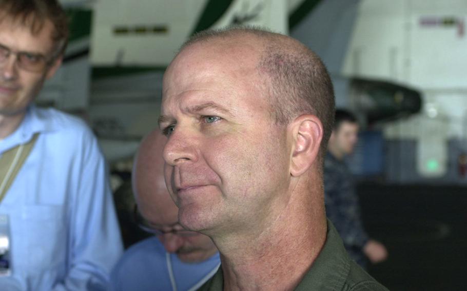 Capt. Ross Myers, commander of USS George Washington Carrier Air Wing 5, answers questions from the media Sunday during the Invincible Spirit exercise in the Sea of Japan.