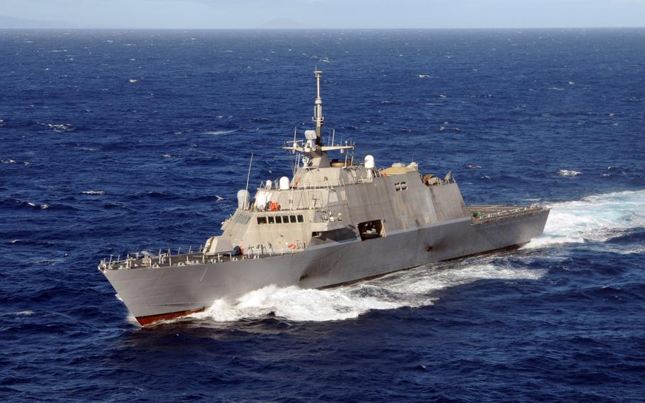 The littoral combat ship USS Freedom operates off the coast of Kauai, Hawaii, during an exercise in July. The Freedom and another littoral ship, the USS Independence, were recently cited for technical flaws and budget overruns in a Government Accountability Office report.