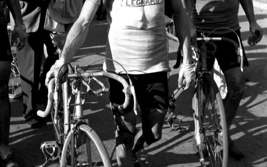 Overall leader Gino Bartali of Italy, the eventual winner, relaxes at the end of the Strasbourg-to-Metz stage of the 1948 Tour de France.