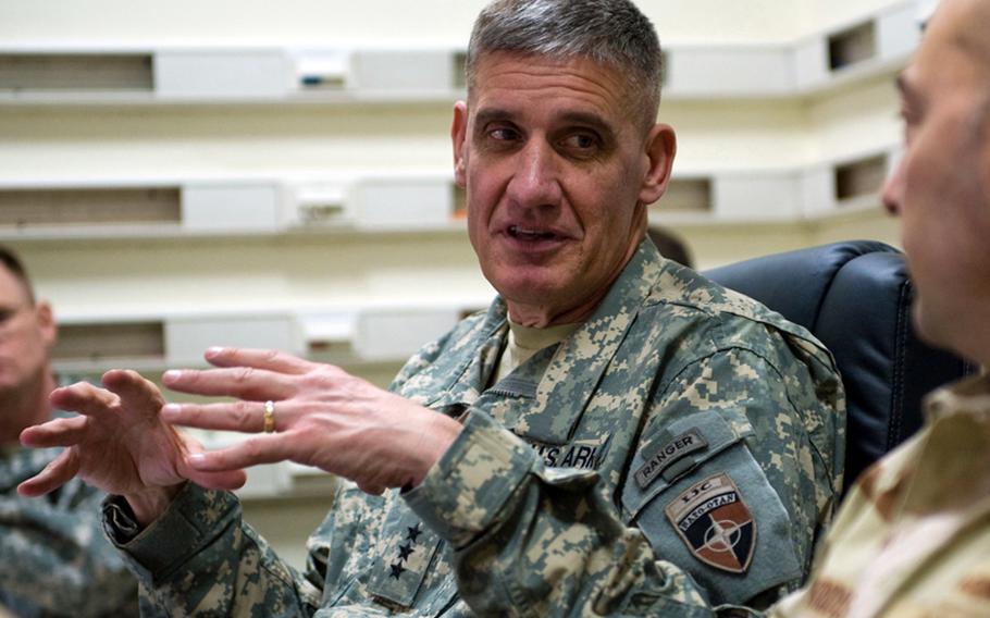 U.S. Navy Adm. James G. Stravidris, right, Supreme Allied Commander Europe, and U.S. Army Lt. Gen. David Rodriguez participate in a situational briefing in Kabul, Afghanistan in this undated photo.