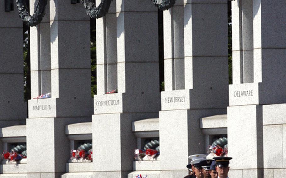 Wreaths are ready to be placed Monday at the National World War II Memorial.