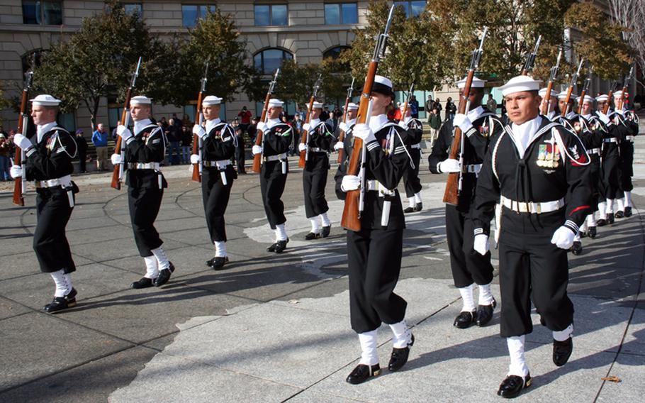 An honor guard takes part in Veterans Day ceremonies at the Navy Memorial in Washington, D.C.