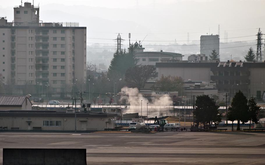Dust begins to settle after the explosion of the 110-pound bomb at Yokota Air Base, Japan on Dec. 7, 2011.