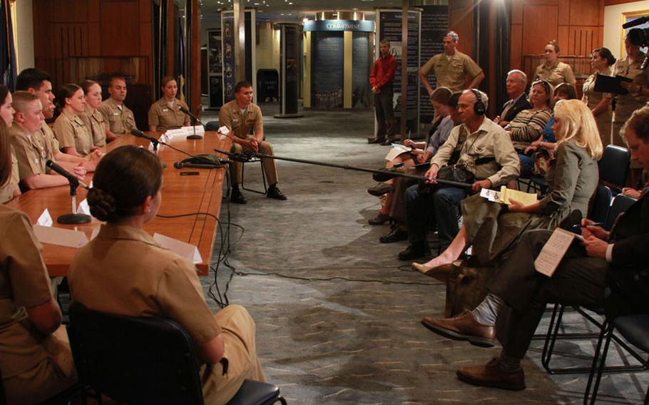 Members of the Navy's submarine fleet speak to civilian and military media during a roundtable discussion at the Navy Memorial in Washington, D.C., to discuss the status of the U.S. submarine fleet.