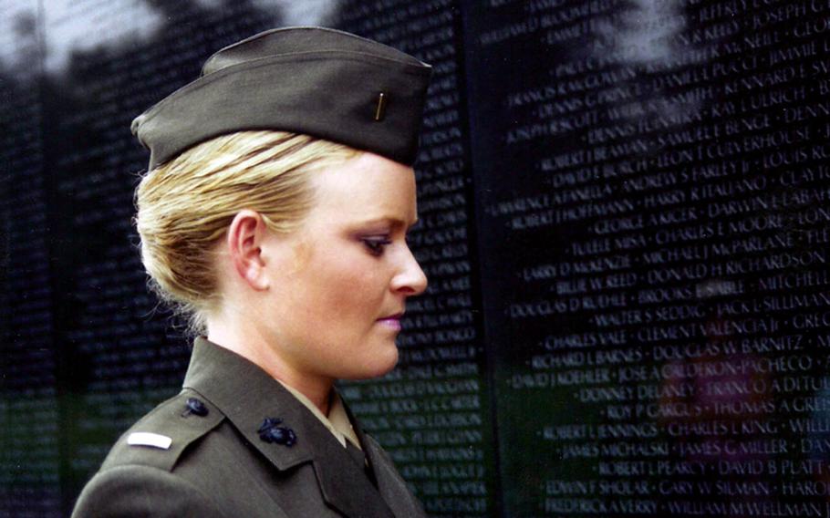 Lt. Elle Helmer, pictured at the Vietnam War Memorial in 'The Invisible War,' a 2012 Academy Award nominated documentary on sexual assault in the military. Helmer, a public affairs officer in the Marine Corps, alleges in a lawsuit she was raped and that after a brief investigation the Corps lost her rape kit.