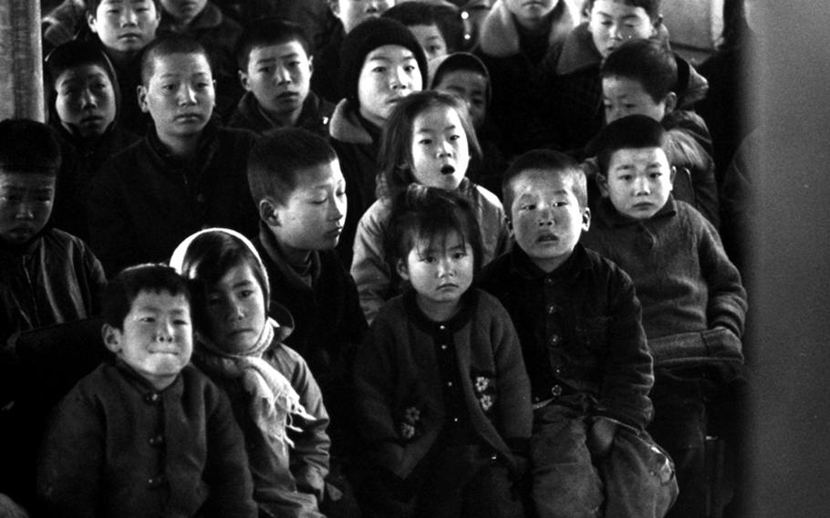 South Korean children in Tae An Myon Township get a first look at television, thanks to President Lyndon Johnson's donation of a set to the village.