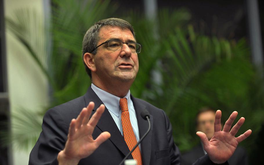 Deputy Secretary of Defense Ashton B. Carter addresses Space and Naval Warfare Systems Command employees at SPAWAR headquarters during a visit to Joint Base Charleston, S.C., for briefings on space and naval warfare systems June 18, 2012.