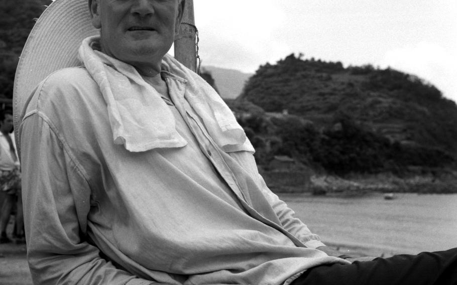 Actor Desmond Llewelyn relaxes on the set of ''You Only Live Twice.'' Although the role of James Bond was played by several actors over the years, one constant in the Ian Fleming-based series of films (with the exception of ''Live and Let Die'') was the presence of Llewelyn as ''Q,'' the master of spy gadgets.