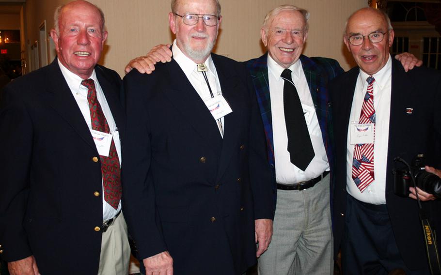 Gus Schuettler, left, at a 2005 Stars and Stripes reunion with fellow photographers Frank Praytor, Red Grandy and Roger Ruhlin.