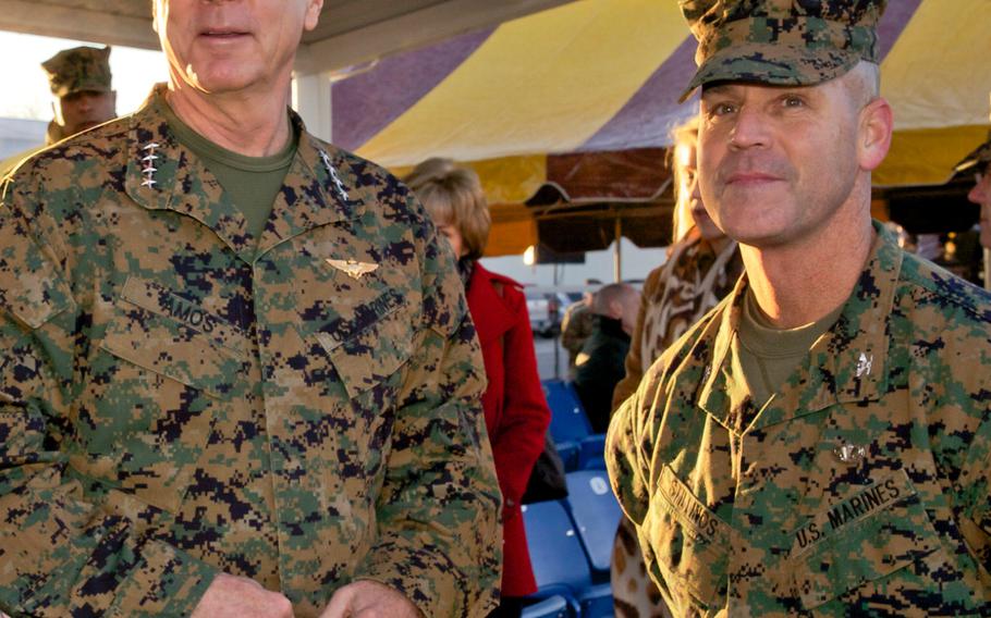 Marine Corps Commandant Gen. James F. Amos, left, with the Commanding Officer of the Officer Candidates School, Col. Kris J. Stillings, at the OCS Graduation Parade for Company C on Marine Corps Base Quantico, Va, Dec. 14, 2012. 