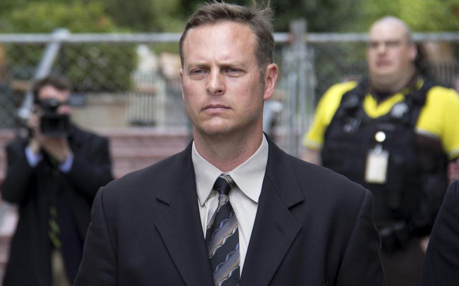 Lt. Col. Jeffrey Krusinski, the Air Force’s point man on sexual assault prevention programs, leaves Arlington County courthouse in May 2013 after not entering a plea to one count of sexual battery.