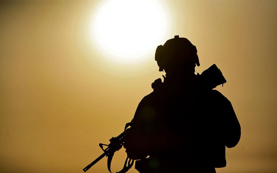 A Marine provides security in Salah Ad Din, Iraq on May 1, 2008 as part of Operation Defeat Al Qaeda in the North. The US remains in armed conflict with al-Qaida and its affiliates, a fight likely to last a decade or two, senior Pentagon officials told Congress on Thursday in arguing against changes to the 2001 military force law used in the war on terror.