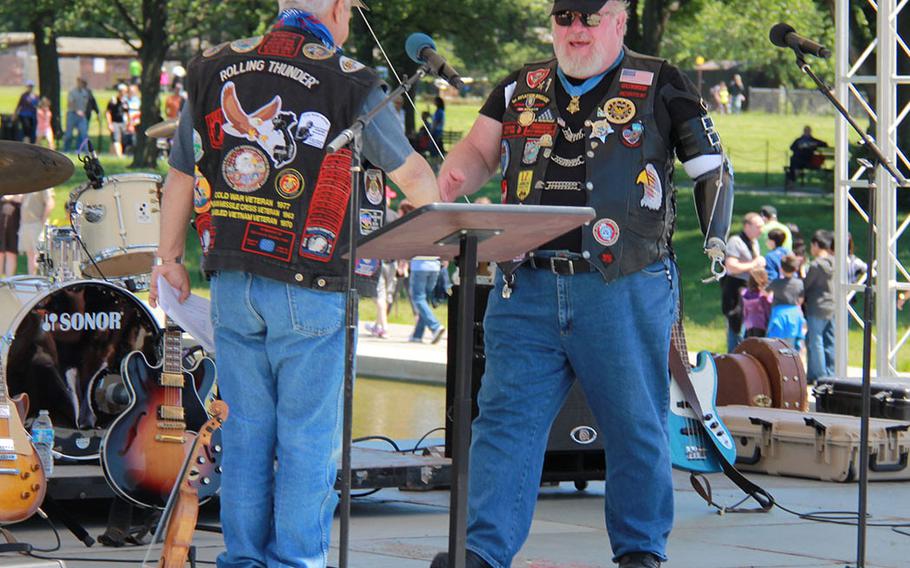 Vietnam War Medal of Honor recipient, Gary G. Wetzel, is called to stage to share a few words with Rolling Thunder audience at the Reflecting Pool facing the Lincoln Memorial on May 26, 2013.