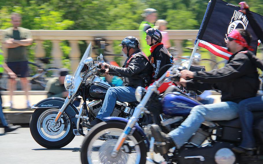 XXVI Rolling Thunder demonstrators ride across the Memorial Bridge in Washington DC on May 26, 2013.