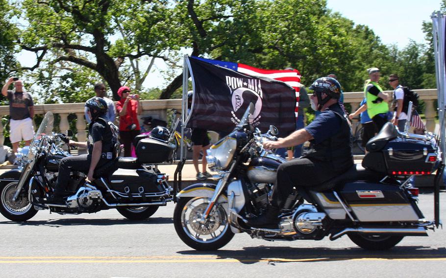 XXVI Rolling Thunder demonstrators ride across the Memorial Bridge in Washington DC on May 26, 2013.
