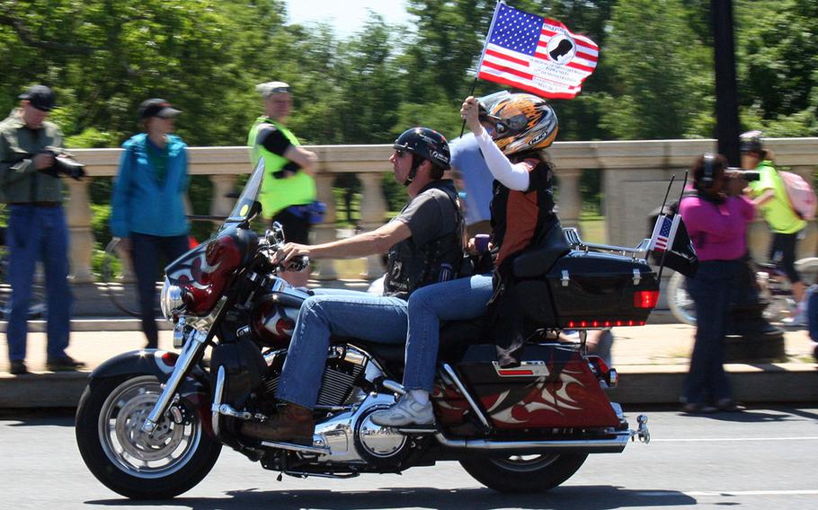 XXVI Rolling Thunder demonstrators ride across the Memorial Bridge in Washington DC on May 26, 2013.