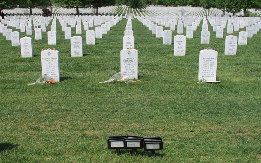 The final resting place for the crew of Spooky 21, lost over Laos in 1965, is seen at Arlington Cemetery, taken May 9, 2013 in Arlington, Virginia.