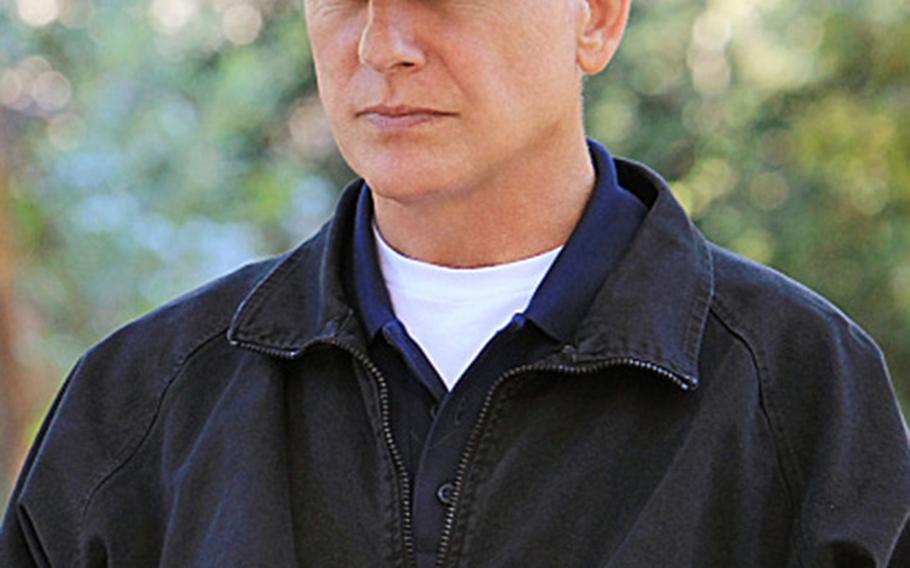 Mark Harmon plays the role of Gibbs on the CBS drama "NCIS." Special Agent Kaylyn Dueker, a real investigator with the service, says "In my office, I am Gibbs," when it comes to her role in cold cases.