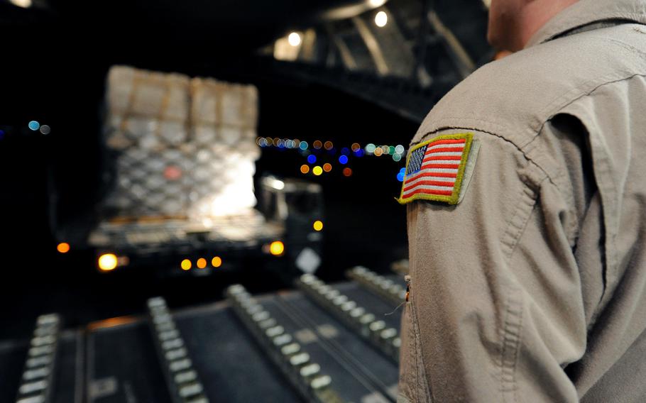 U.S. airman at an undisclosed base in Southwest Asia in April 2013 load pallets of non-lethal aid on to a C-17 aircraft. U.S. military assets have been used to provide such aid to the rebels in the Syrian civil war.