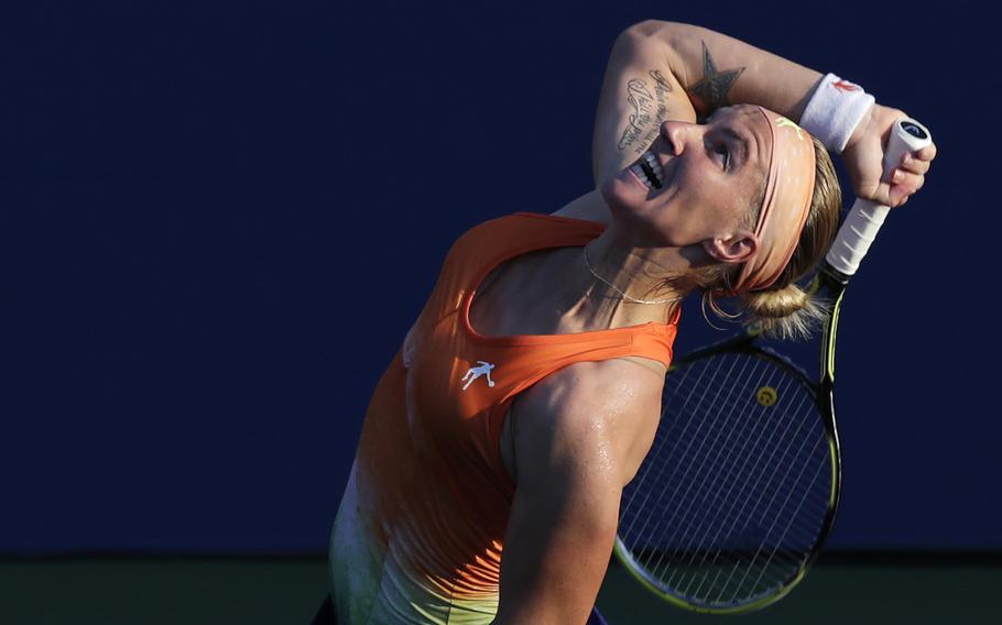 Svetlana Kuznetsova, of Russia, serves against Mallory Burdettte, of the United States, during the first round of the 2013 U.S. Open tennis tournament, Tuesday, Aug. 27, 2013, in New York. (AP Photo/Charles Krupa)