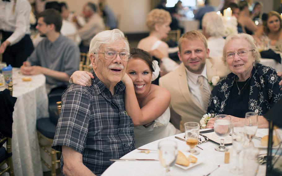 William Bailey, left, saw his granddaughter, Shannon Rasmussen, second from left, marry Jeff Herron, second from right, with his wife, Elizabeth Bailey, right. It was his last public event before he died. 
                