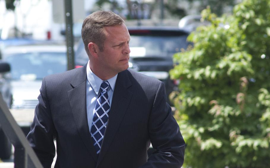 Lt. Col. Jeffrey Krusinski, formerly the Air Force's point man on sexual assault prevention programs, arrives at the Arlington County courthouse on July 18, 2013. A jury on Nov. 13, 2013 found Krusinski not guilty of assault and battery against a 23-year-old Virginia woman in a May 2013 incident.