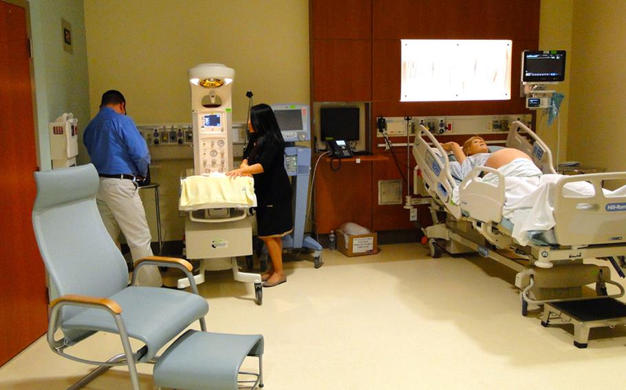 The new Naval Hospital Camp Pendleton's simulation lab has adult and child simulators, including a pregnant woman that screams, blinks and gives birth, and a baby that cries and moves its limbs. 