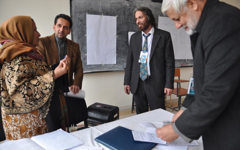 Members of the Afghan Loya Jirga discuss a security agreement that would pave the way for foreign troops to stay in Afghanistan past the end of 2014. The jirga, a gathering of 2,500 community leaders from around the country, was convened by President Hamid Karzai who has said he will respect the council's decision on the security agreement.