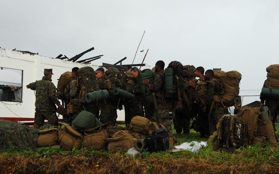 Marines prepare to leave Guiuan on Friday.After more than a week on the ground helping Typhoon Haiyan victims, the Marines are packing up and heading back to Okinawa.