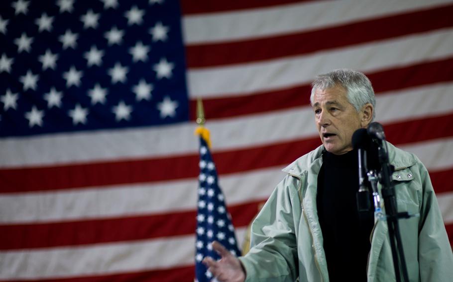 U.S. Defense Secretary Chuck Hagel speaks to troops and officials at Camp Leatherneck in the Helmand province of Afghanistan, Dec. 8, 2013.