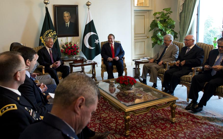 U.S. Defense Secretary Chuck Hagel, left, meets with Pakistani Prime Minister Nawaz Sharif in Islamabad, Pakistan, Dec. 9, 2013.