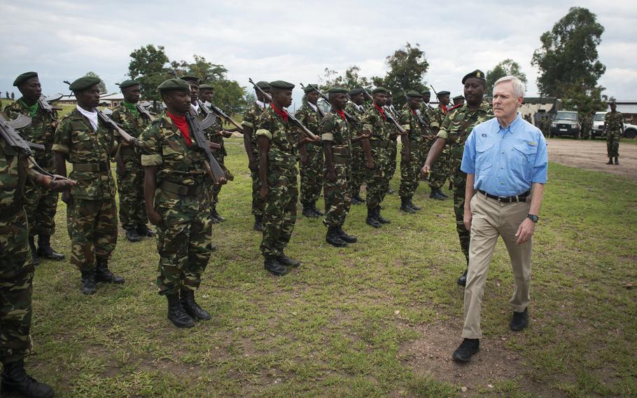 Secretary of the Navy Ray Mabus reviews Burundi National Defense Force (BNDF) troops during a visit to Bujumbura, Burundi, Nov. 21, 2013. A Pentagon spokesman said Dec. 9, 2013 that 850 Burundian troops will be airlifted from Burundi to CAR in U.S. C-17s for a peacekeeping mission in the Central African Republic.