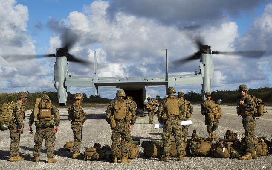 An MV-22B Osprey disembarks Marines Dec. 9, 2013 at Baker runway on Tinian's North Field during Exercise Forager Fury II during training on Guam and within the Mariana Island Range Complex. A defense budget proposed this week by the House and Senate would continue to restrict spending on the relocation of Okinawa-based Marines to Guam and Hawaii as part of a military realignment in the Pacific.