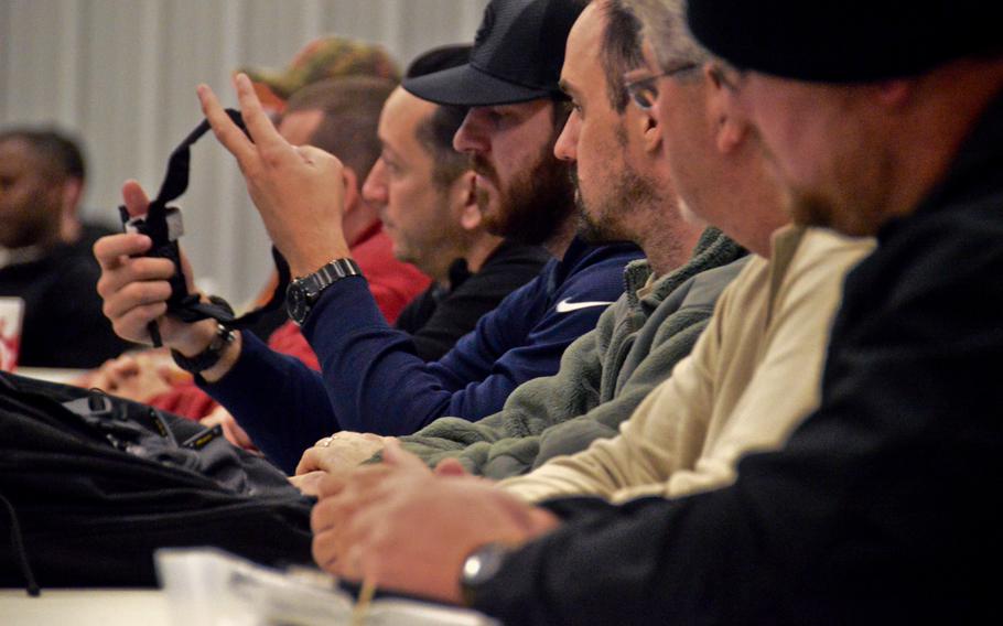 Civilian contractors participate in familiarization classes on personal protective equipment at the Camp Atterbury on Nov. 20, 2013. (Photo by , Atterbury-Muscatatuck Public Affairs)
