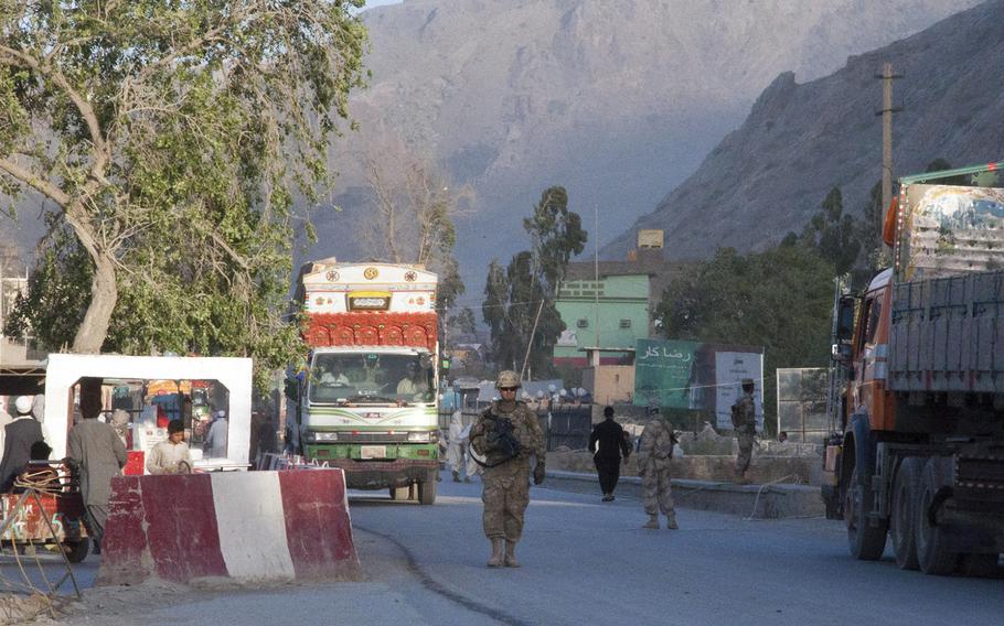 A U.S. soldier patrols at Torkham Gate, in Afghanistan on May 21, 2011.