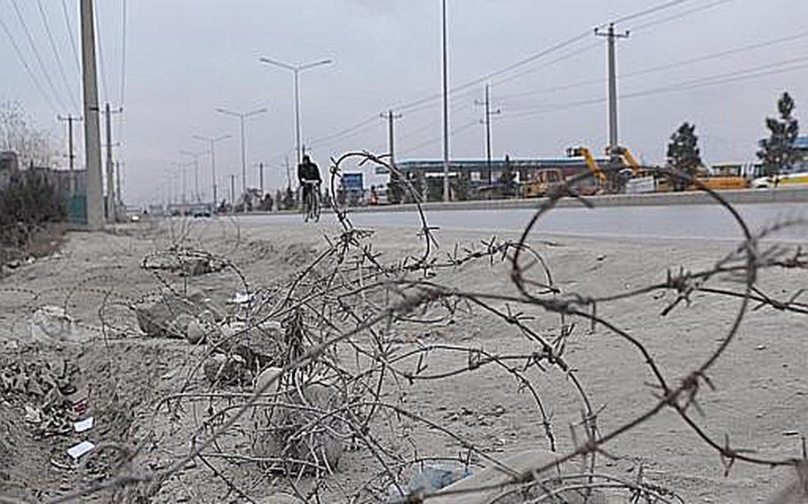 Friday's deadly suicide bombing took place on a busy thoroughfare, lined in some places with barbed wire, a few hundred feet from Camp Phoenix, an American military base. Three coalition troops were killed and several civilians wounded in the blast.