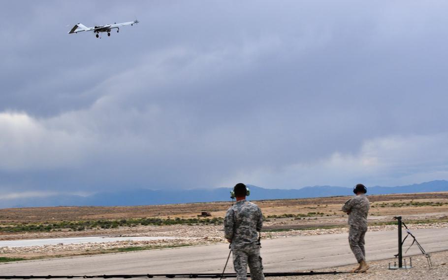 Soldiers with the 41st Special Troops Battalion, Oregon Army National Guard, observe the launch of a Shadow Unmanned Aerial Vehicle at Orchard Combat Training Center, near Boise, Idaho, June 13, 2013.
