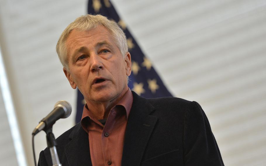 Defense Secretary Chuck Hagel answers questions from wounded warriors during a town hall meeting at the Center for the Intrepid at Brooke Army Medical Center on Joint Base San Antonio, Jan. 8, 2014.