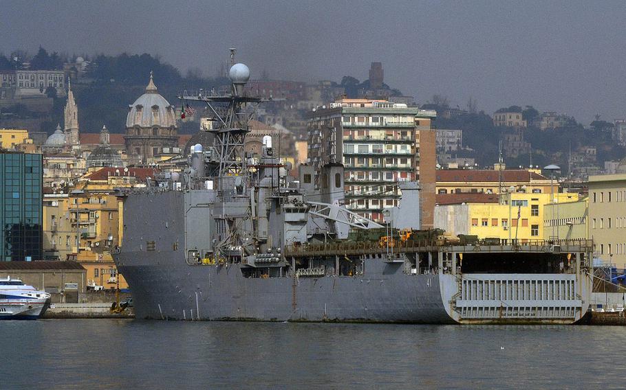 The amphibious dock landing ship USS Whidbey Island is moored to a port facility Naples, Italy, on Jan. 1, 2012.