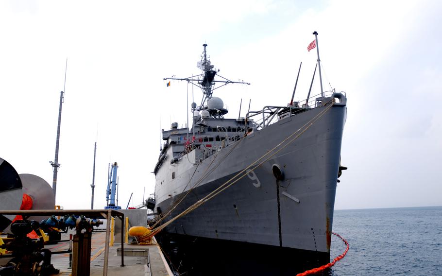 Sailors and Marines prepare the USS Denver to make way for Thailand from Naval Facility White Beach, Okinawa, Feb. 4, 2014. Sailors from the Denver and members of the 3rd Marine Division are heading to Thailand in support of the upcoming Exercise Cobra Gold 2014.
                