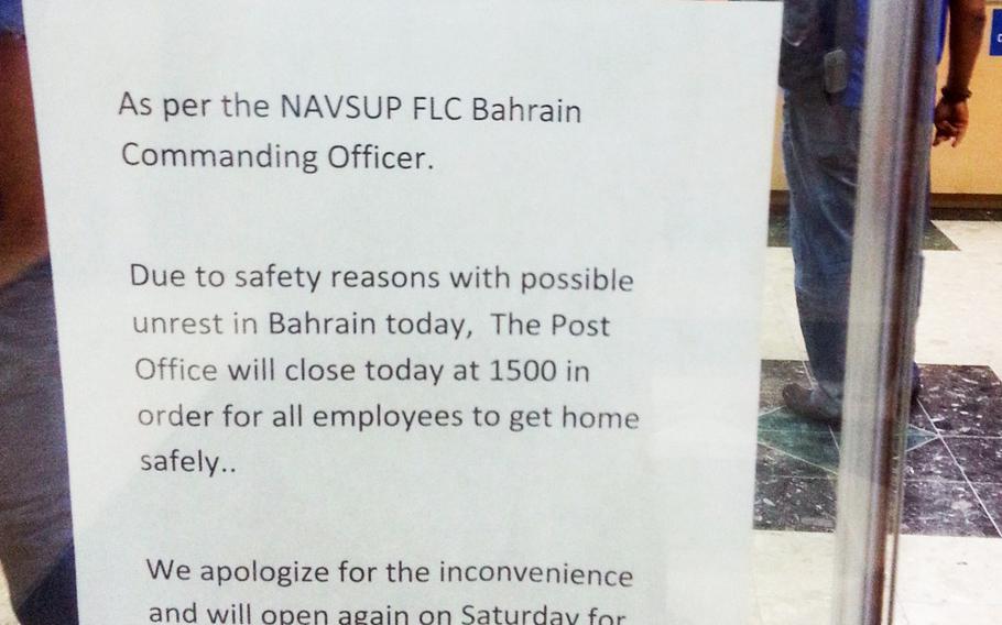 A sign at the post office on Naval Support Activity Bahrain informs customers that it would be closing early Feb. 13, 2014, for safety reasons in anticipation of increased political unrest.
Hendrick Simoes/Stars and Stripes