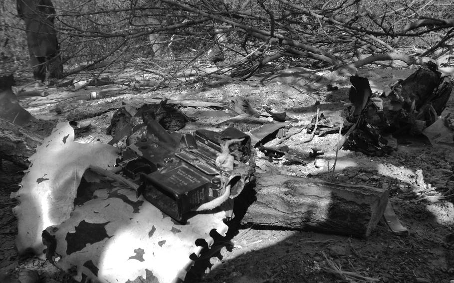 Wreckage of a Chinook helicopter shot down last week is seen at the site of crash at Tangi Valley in Wardak province some 60 miles (97 kilometers) southwest of Kabul, Afghanistan, Thursday, Aug. 11, 2011. The Chinook helicopter that insurgents shot down over the weekend burst into flames before hitting the ground, leaving wreckage scattered on both sides of a river in eastern Afghanistan and killing 30 Americans and eight Afghans, witnesses told The Associated Press on Thursday. The crash of the Chinook CH-47, was the deadliest single loss for U.S. forces in the nearly 10-year Afghan war.